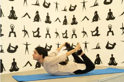 Dhanuvakrasana